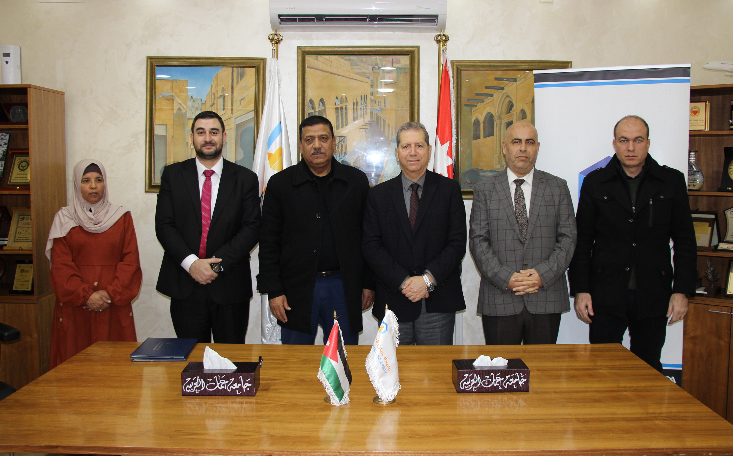 اتفاقية تعاون بين "عمان العربية" ولجنة خدمات مخيم البقعة1